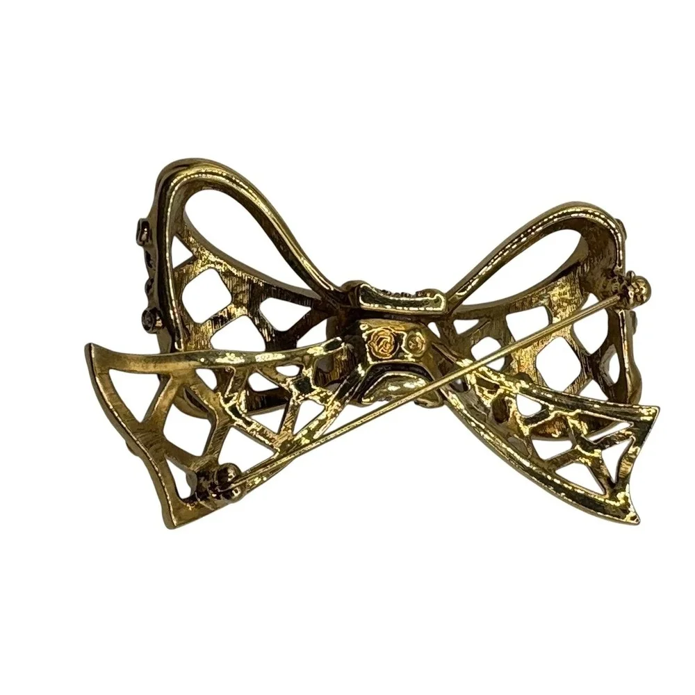 Swan Signed SWAROVSKI Open Bow Brooch Pin Icy Clear Crystals‎ Gold Tone Ribbon